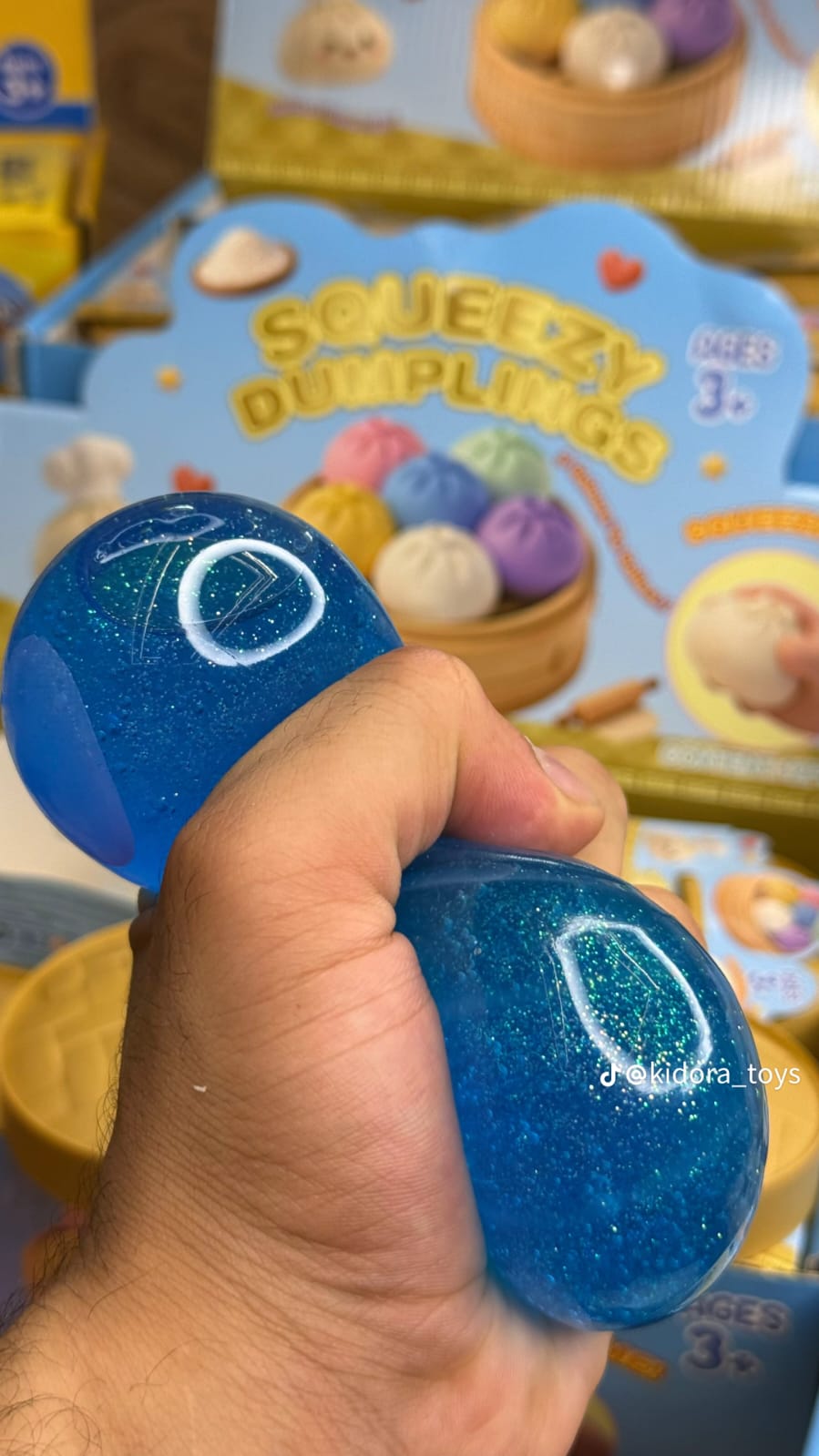 سكويشي دملينج جلي لامع – لعبة ضغط شفافة مضادة للتوتر (Glitter Jelly Dumpling Squishy)