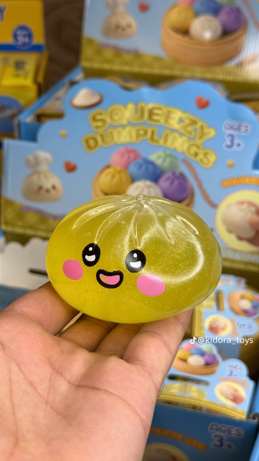 سكويشي دملينج جلي لامع – لعبة ضغط شفافة مضادة للتوتر (Glitter Jelly Dumpling Squishy)